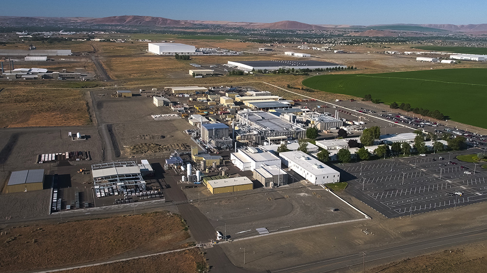 View of Richland Washington showing the Columbia River with recreational areas and surrounding landscape